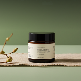 Pranaglow nourishing face moisturizer jar on a green background