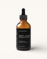 Pranaglow Root + Scalp Strength Oil bottle on a white background